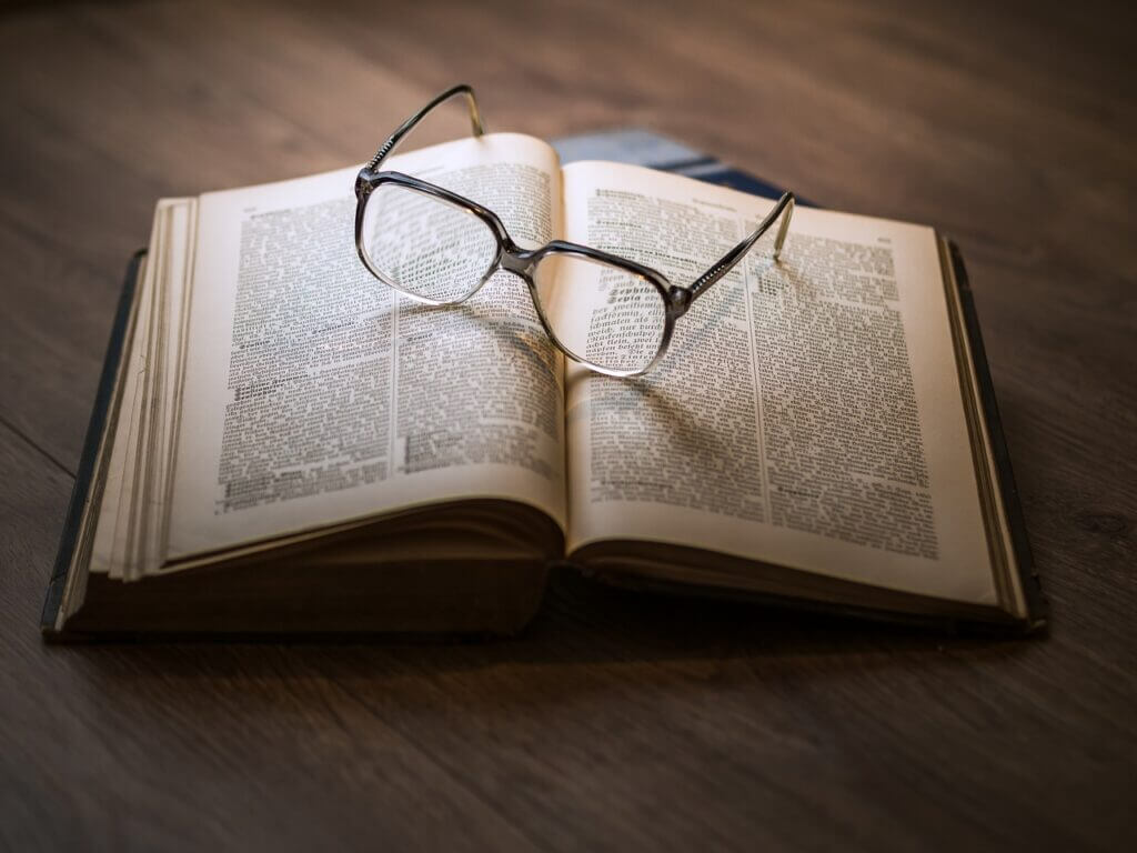 glasses, book,